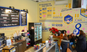 Socializing in donut store; Photo Credit: Lauren Peters at Visit Portland