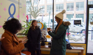 Socializing in donut store; Photo Credit: Lauren Peters at Visit Portland