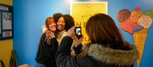 Friends taking pictures, Photo Credit: Lauren Peters at Visit Portland