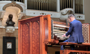 Playing the Kotzschmar Organ; Photo Credit: Kirstie Archambault at Visit Portland