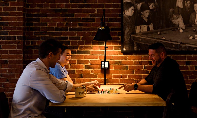 Small Group Playing Board Game. Photo Credit: Amanda Huebner Photography