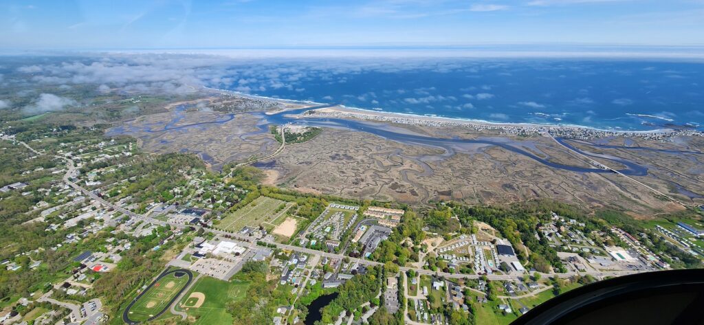 Maine coast and marsh. Photo Credit: Pine Tree Helicopters