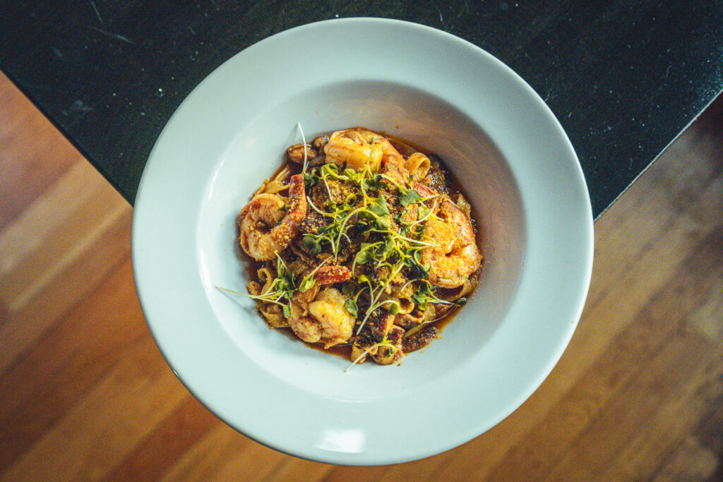 Shrimp Pasta Dish at Roma. Photo Credit: Northern Attitude Creative Shrimp Pasta Dish at Roma. Photo Credit: Northern Attitude Creative