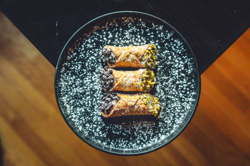 Cannolis at Roma. Photo Credit: Northern Attitude Creative