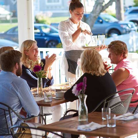 Outdoor Seating. Photo Provided by Higgins Beach Inn Outdoor Seating. Photo Provided by Higgins Beach Inn
