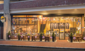 Exterior of Eighty 8 Donut Cafe on foggy day; Photo Credit: Peter G. Morneau Photography