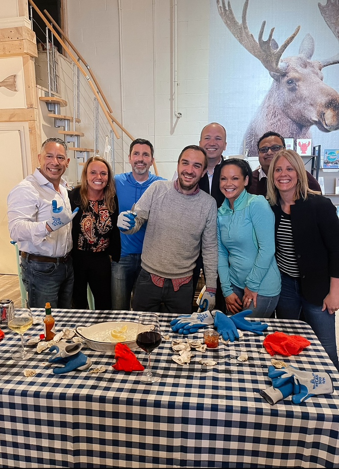 Group Oyster Shucking. Photo Credit: The Briny Babe, LLC