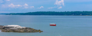 Boat sitting in Casco Bay; Photo Credit: Peter G. Morneau Photography