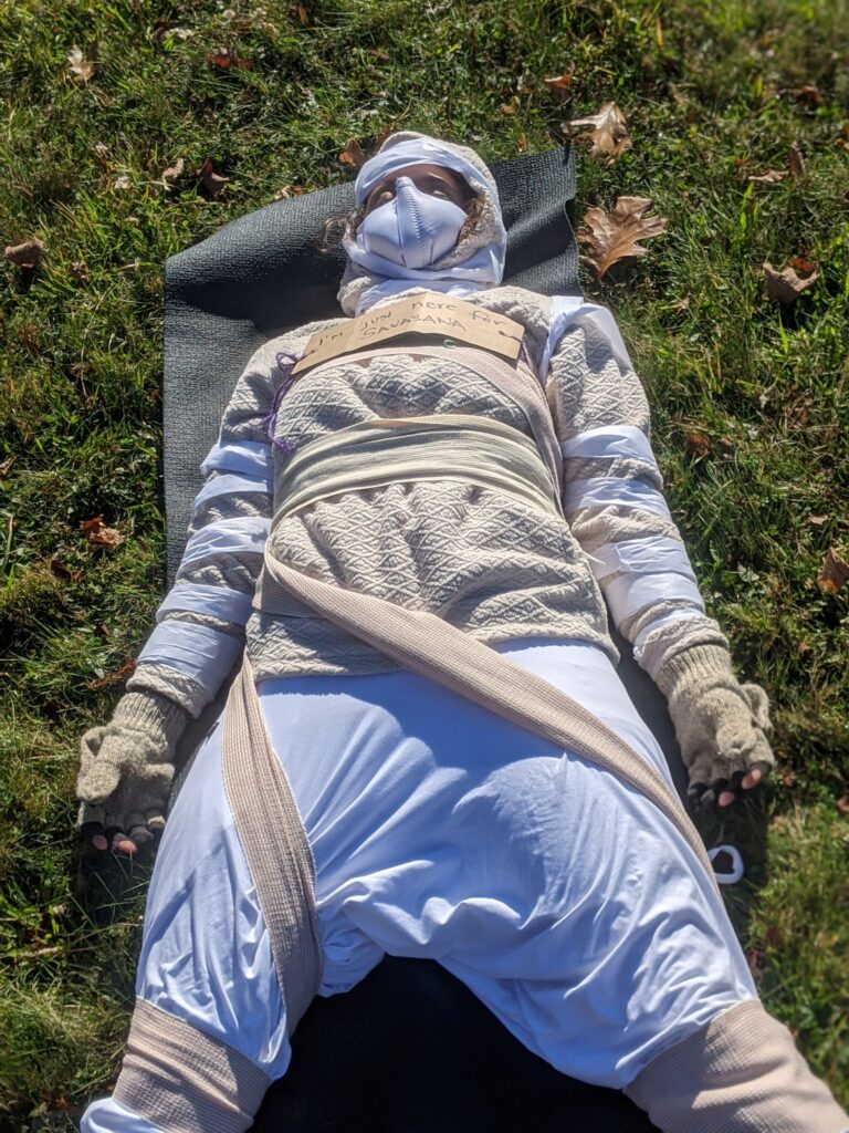 Savasana, SpOoKy Yoga; Photo courtesy of Ashley Flowers Yoga