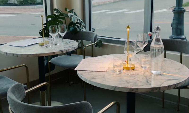 Tables at Angoor Wine Bar. Photo Credit:: @em_ellison