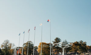 Flags flying outside of Maine Maritime Museum; Photo Credit: Kivalo