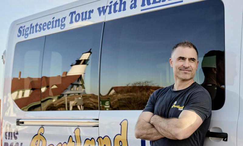 Owner with Real Portland Tour Bus; Photo Credit: Michael Wilson