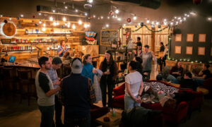 Group enjoying Axe Pit bar; Photo Credit: Nate Davis