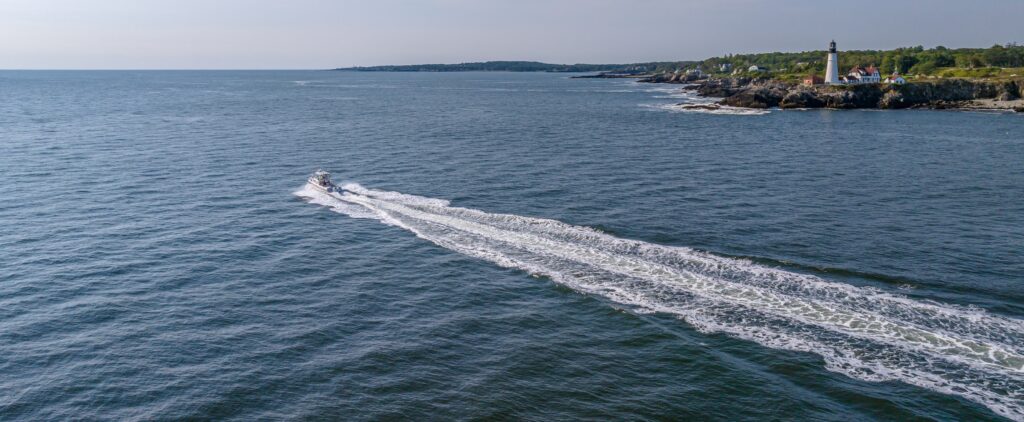 Fore River Sports Fishing Boat Passing Portland Head Light, Peter G Morneau Photography Fore River Sportfishing Boat Passing Portland Head Light, Peter G Morneau Photography