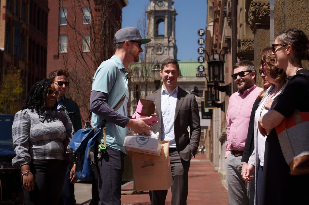 Tour Guide with Group. Photo Credit: Good Maine
